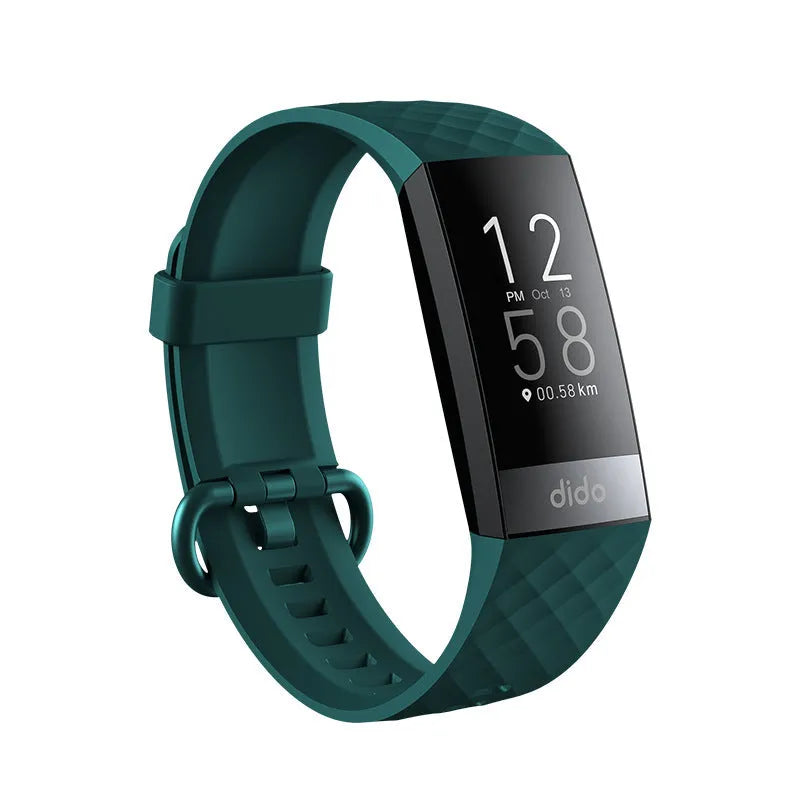 Black smart bracelet on wrist showing blood pressure and heart rate data on its 1.1-inch screen.
