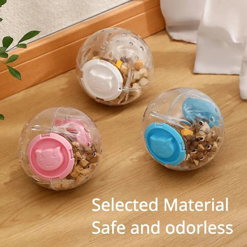 Clear ABS plastic cat slow feeding ball with treat dispenser holes