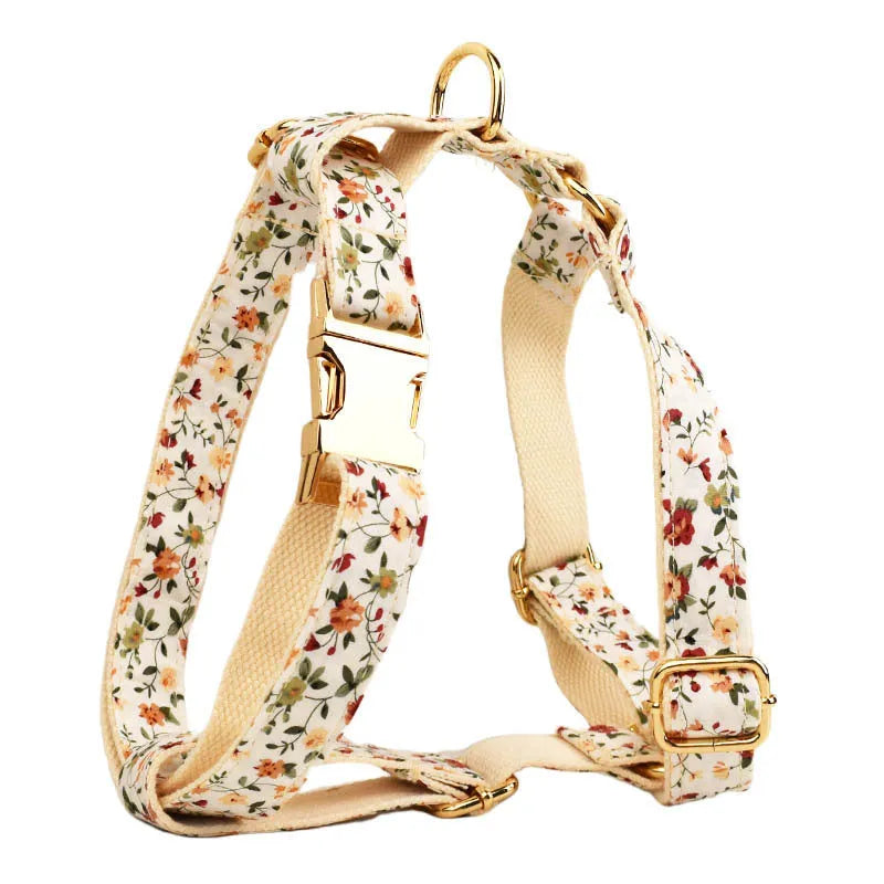 White flower pet dog collar suit set with cloth vest, bow, leash, and poop bag for small dogs.