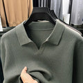 Man modelling a loose-fit green casual pullover sweater for autumn.