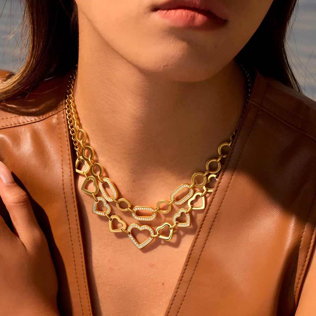 Geometric heart-shaped stainless steel necklace with 18K gold electroplated finish on clavicle chain