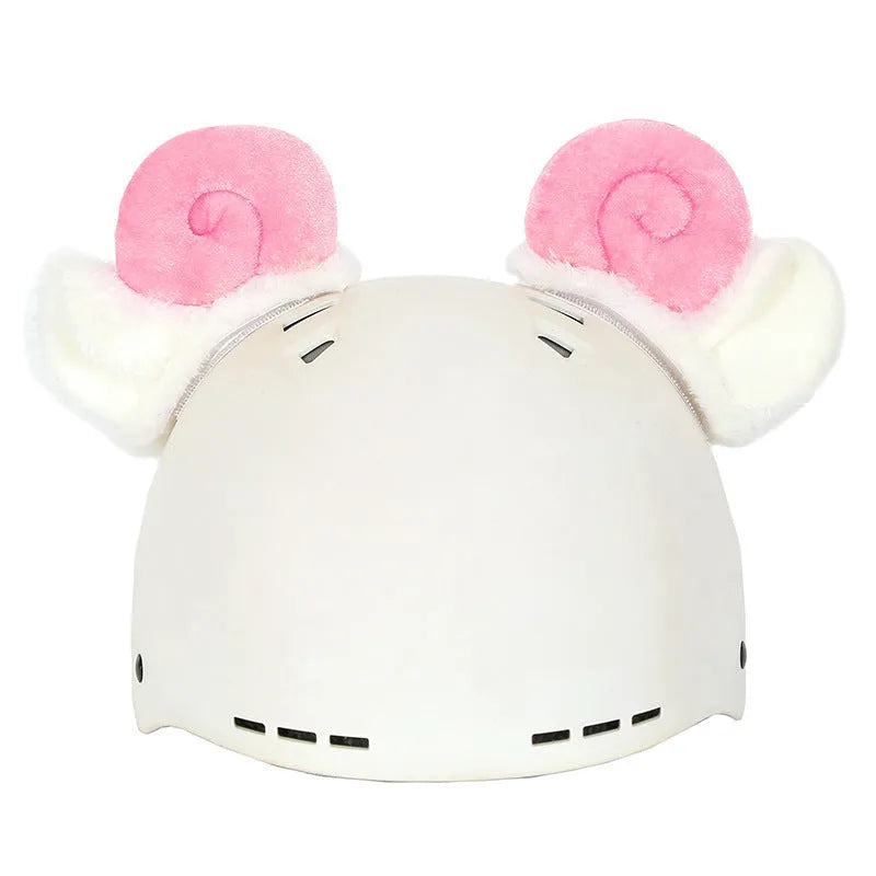 Plush cartoon-themed cover set on a medium motorcycle helmet with soft ear decorations.
