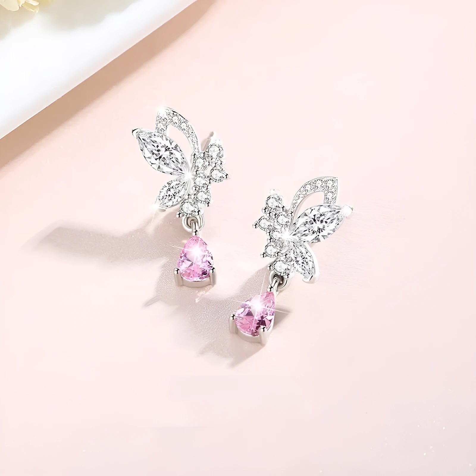 925 sterling silver butterfly stud earrings for women with purple crystal accents on a white background.