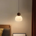 Creative pumpkin-shaped Nordic style ceiling chandelier in alloy, shown in single head and three head configurations.