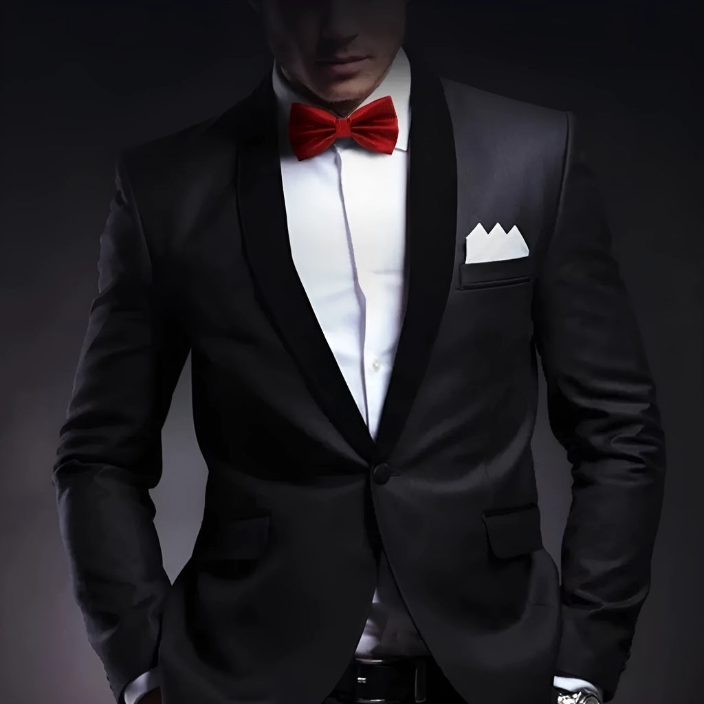 Flat-head polyester bow tie in a solid colour, shown with dimensions 12 cm by 6 cm.