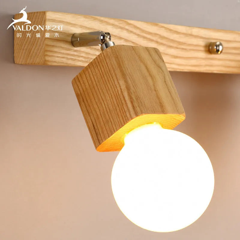Single head LED wall lamp in 24cm size for bathroom or bedroom mirror lighting.
