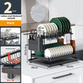 White double-layer kitchen storage rack with a removable draining tray.