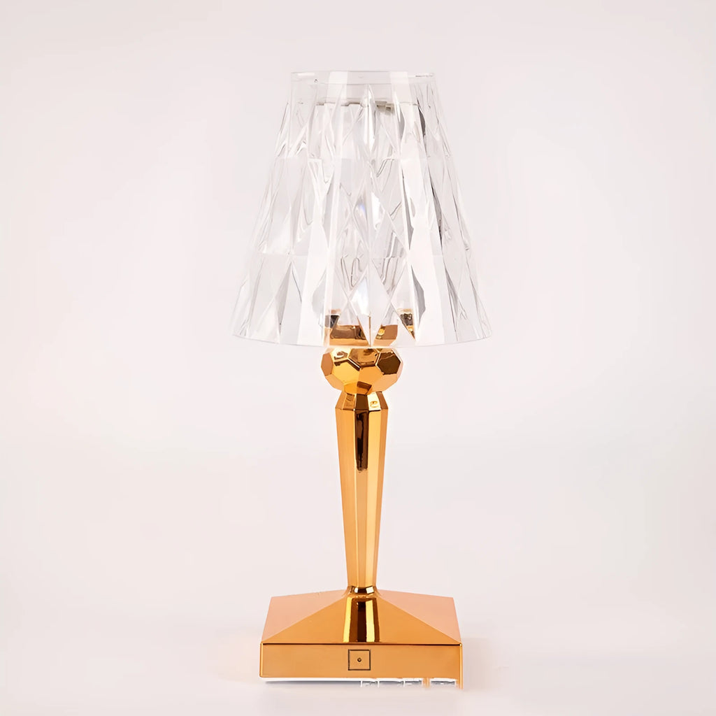 Rose gold portable touch night light on a surface, showing its acrylic construction and modern design.