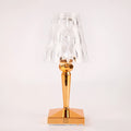 Rose gold portable touch night light on a surface, showing its acrylic construction and modern design.
