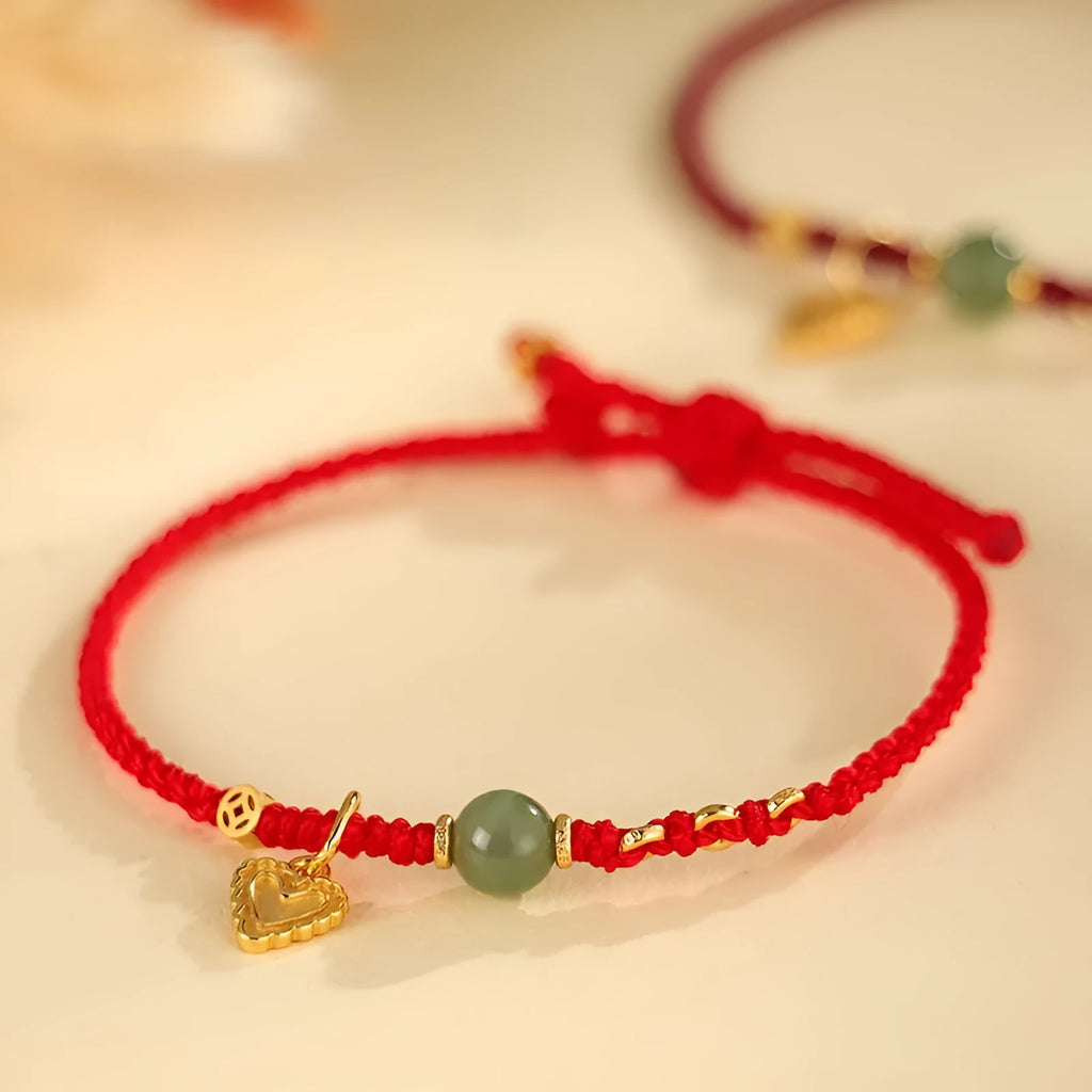 Handmade woven women's bracelet crafted from 925 silver with Hetian jade in red colour option