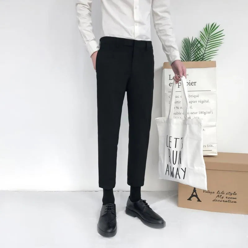 Men's straight-leg cotton trousers with drawstring waist in black, grey, and khaki colours
