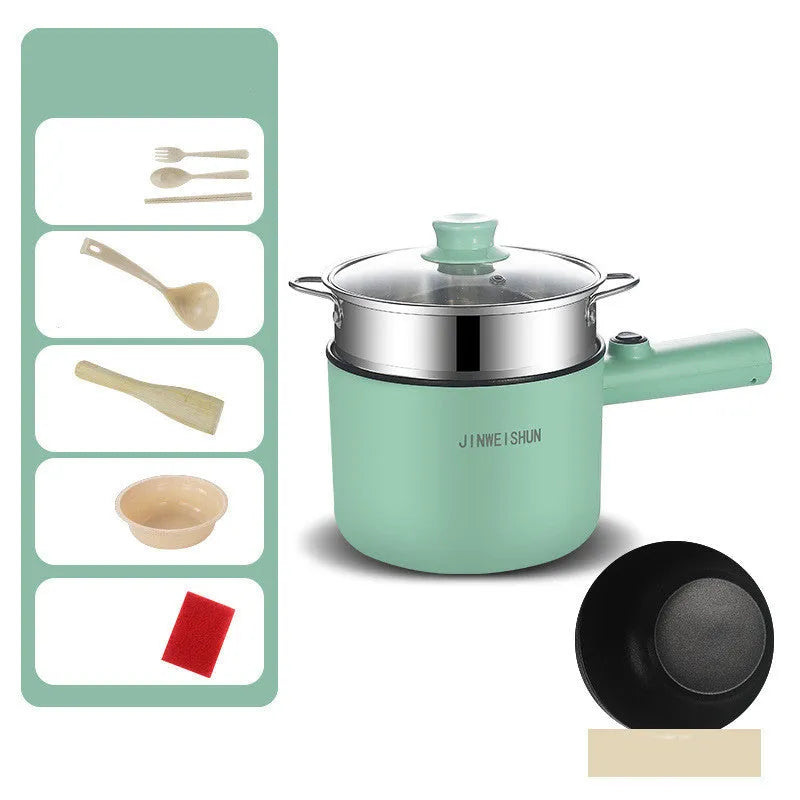 Compact white electric multi-function hot pot with non-stick interior on a kitchen countertop