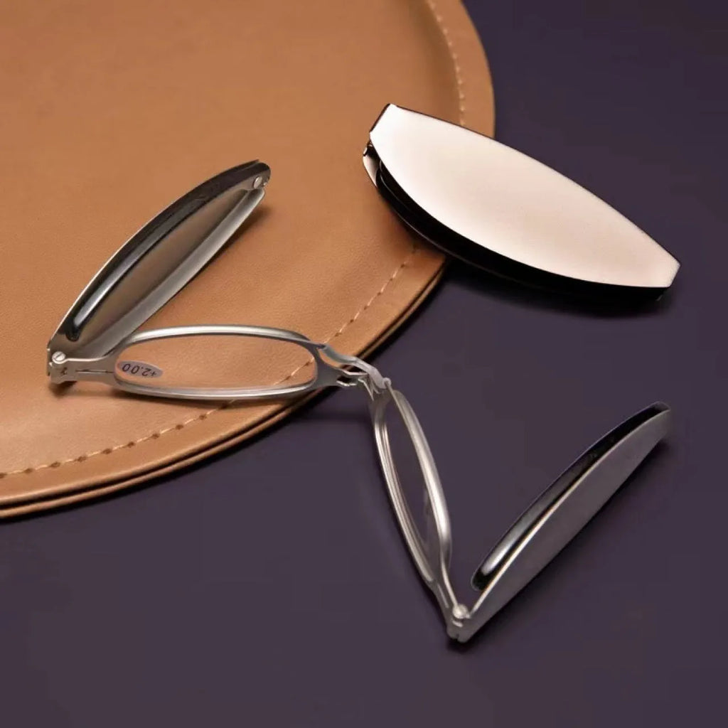Folding presbyopic glasses with retro ring style frame shown in black and silver colour options