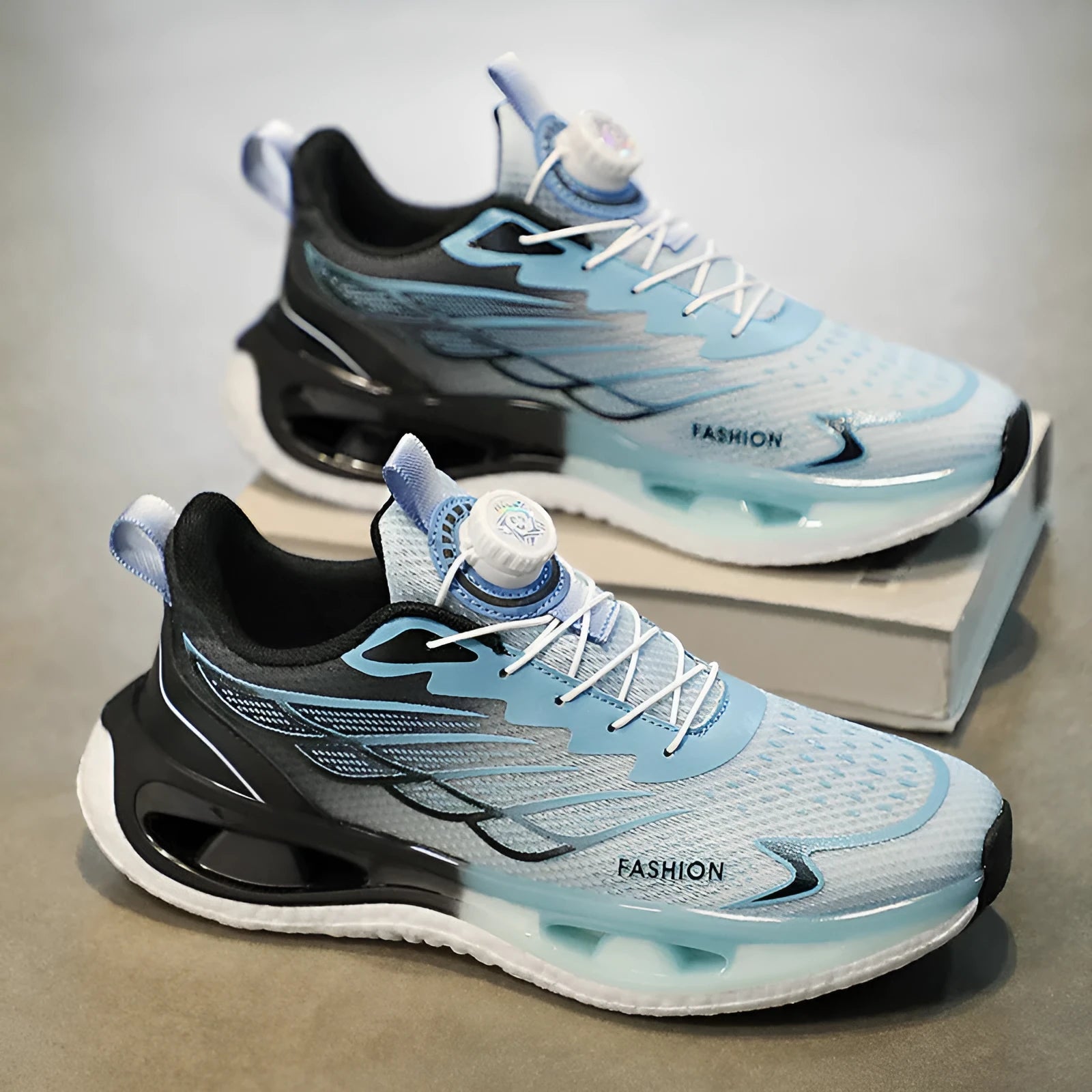 Youth button sneaker with shock absorption rotating sole in light blue, black, or white and blue colours
