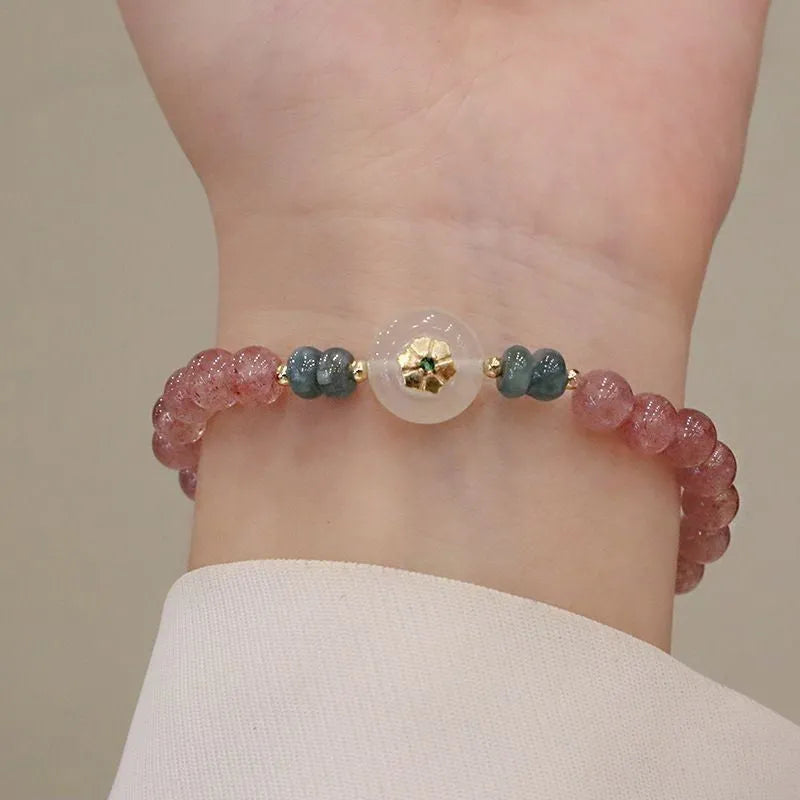 Strawberry quartz and blue water emerald pendant bracelet with round jade centrepiece and geometric diamond elements