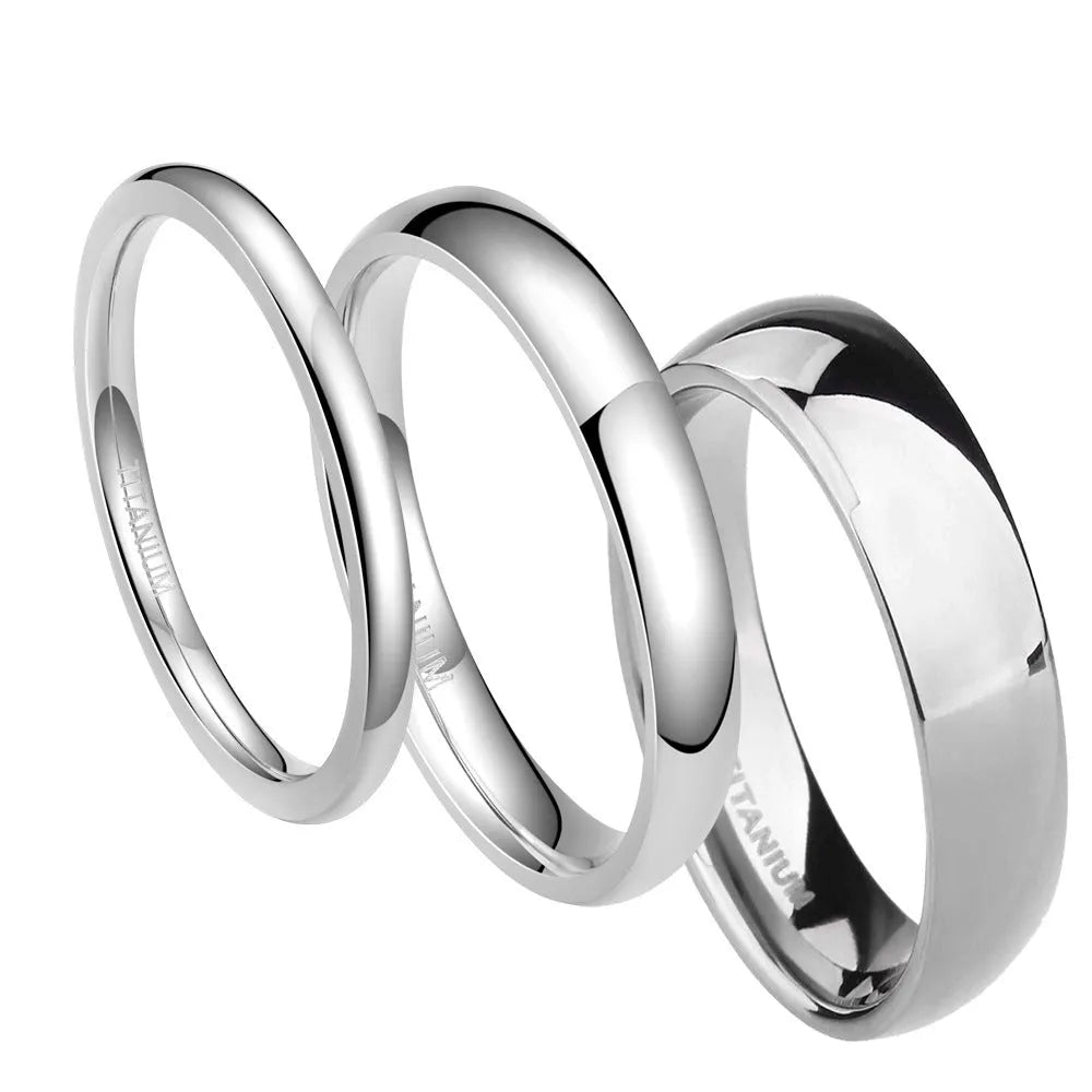 A polished silver titanium ring shown in three width options: 2mm, 4mm, and 6mm.