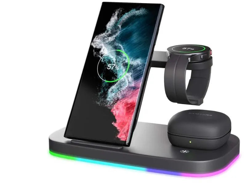 Vertical 3-in-1 wireless charging stand for mobile phone, smartwatch, and headphones on a desk.