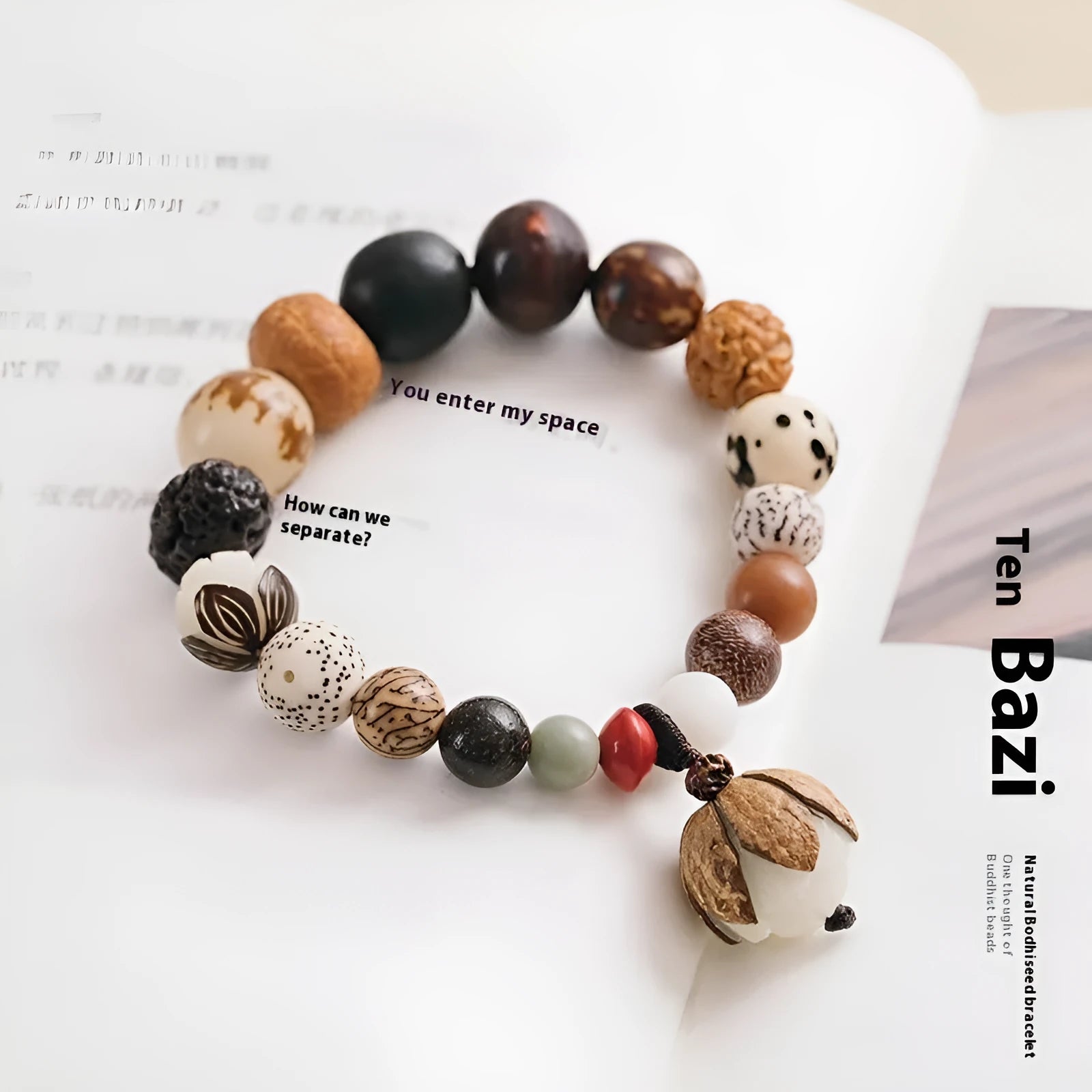 Handmade rudraksha bead bracelet with 18 seeds on a string, showing 16 cm loop.