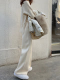 Women's high waist knitted wide-leg trousers in cream white with straight-leg cut