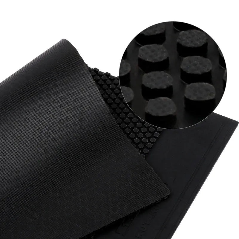 Single sheet of small pips-out table tennis rubber in black and red colour options.