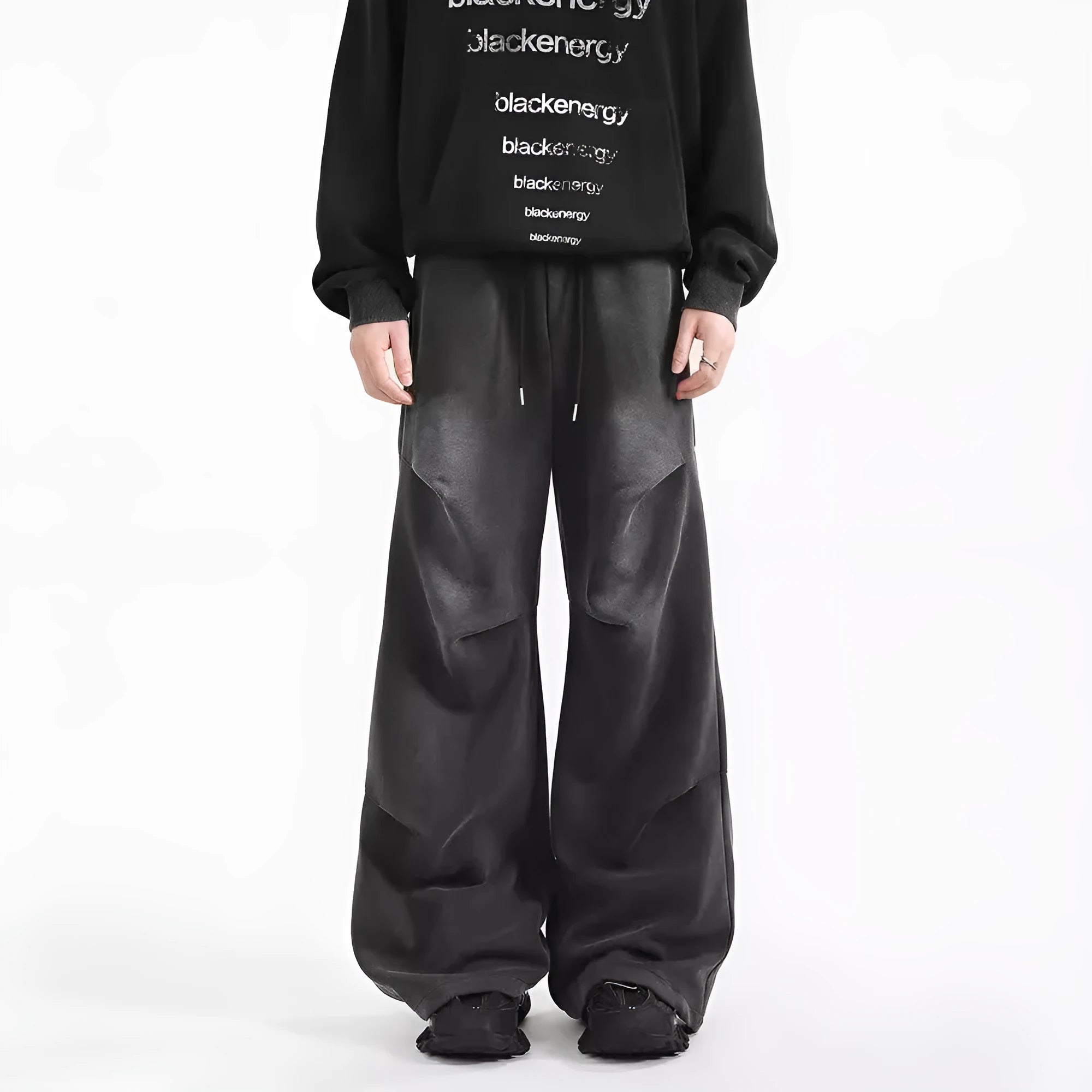 Men's pleated straight loose sweatpants in black and grey, cotton fabric, elastic waist, American washed finish.