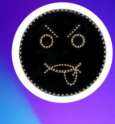 Black car rear window LED light with orange smiley face pattern and wireless remote control