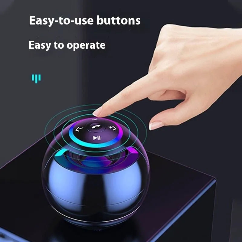 Mini Bluetooth speaker in black with dynamic bass boost and card insertion, suitable for portable outdoor use
