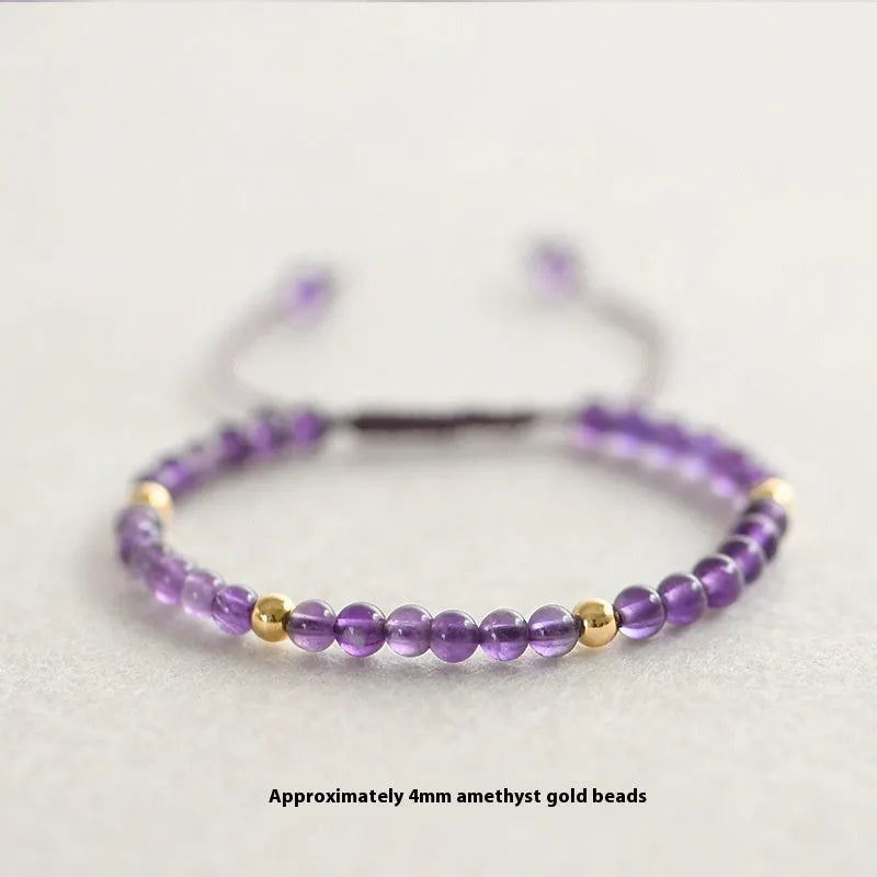 Handmade purple amethyst bracelet with 4mm stones and 14K gold clasp on wrist