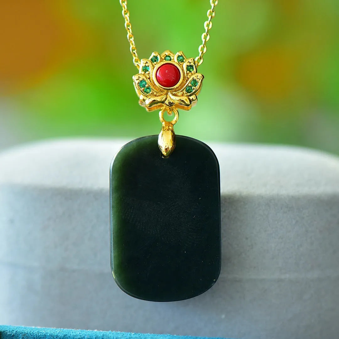 Natural Hetian jade flat pendant with copper inlay showing grey and ink blue stone variations on necklace