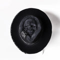 Handmade wool felt and denim conical crown skull hat for Halloween costumes.