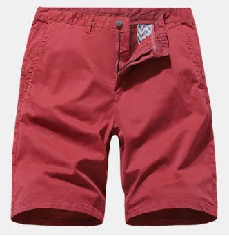 Men's loose blue denim shorts with a straight leg cut on a plain background.