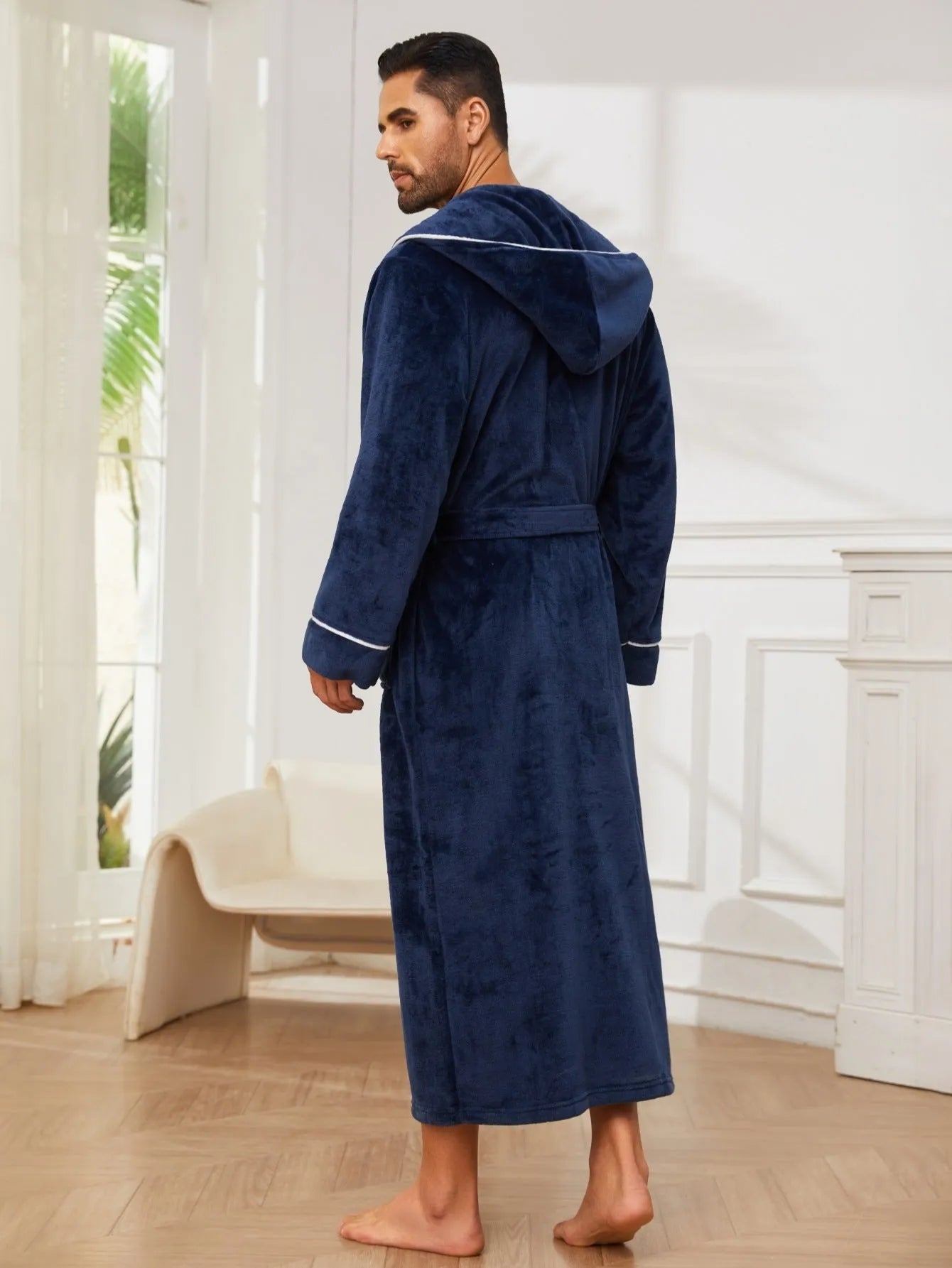 Men's flannel fleece bathrobe in light grey hanging on hook, European/American style