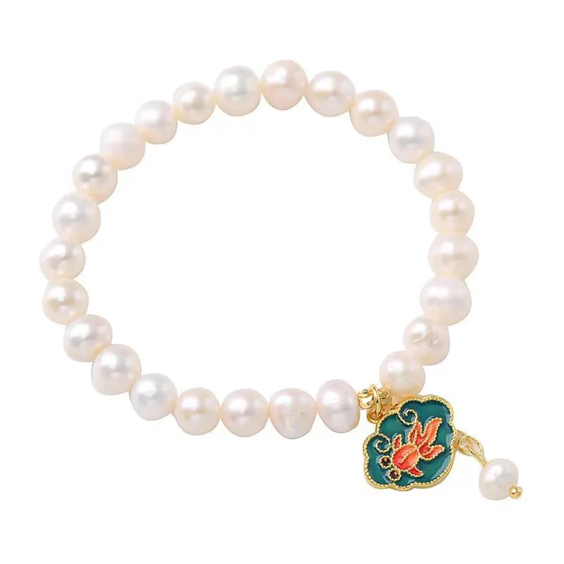 White freshwater pearl bracelet with lotus goldfish pendant in antique baroque style