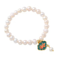 White freshwater pearl bracelet with lotus goldfish pendant in antique baroque style