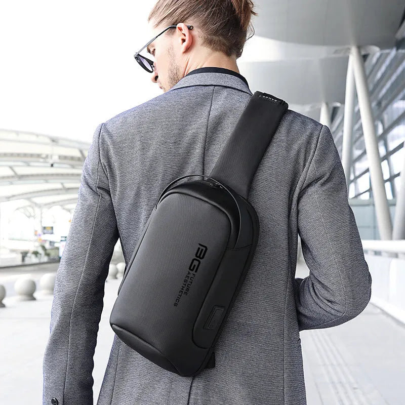 Men's oxford cloth shoulder bag with USB charging port in blue colour with letter pattern design
