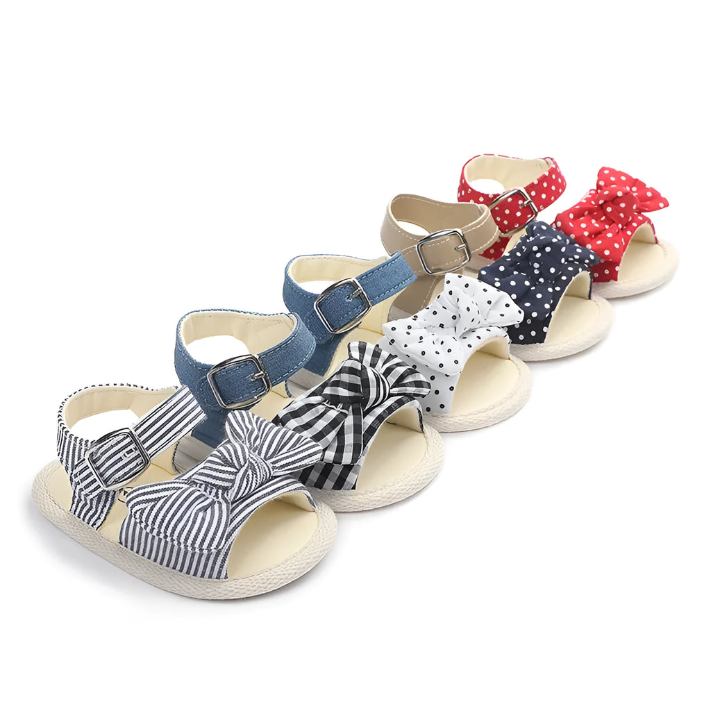 Black and white Velcro fastening toddler shoes for infants with low-cut design
