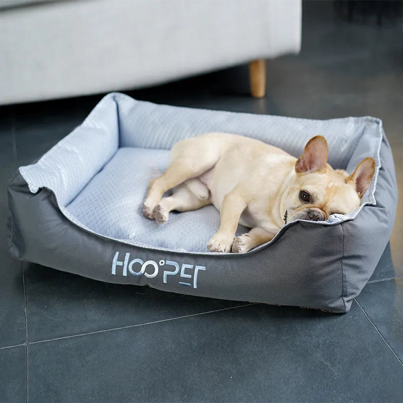 Soft grey pet bed with removable cover in small, medium, and large sizes for dogs and cats