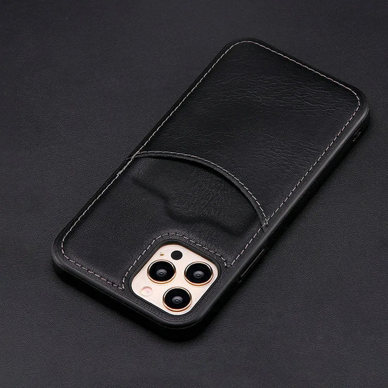 Dark blue PU leather protective case for iPhone mobile phones on a table.