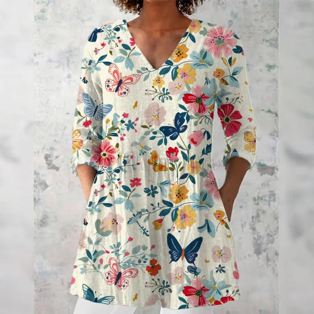 Women's slim fit long-sleeved top with a retro digital print design in a selected colour.