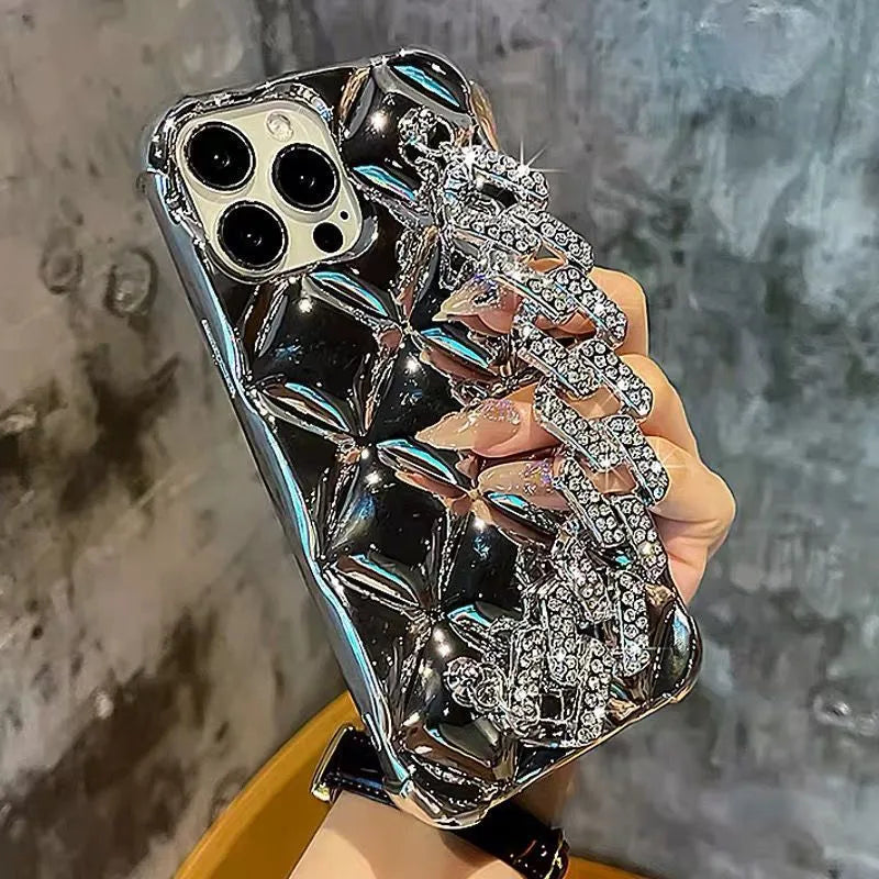 iPhone case with attached chain bracelet and rhinestone charm in plated rhombus pattern