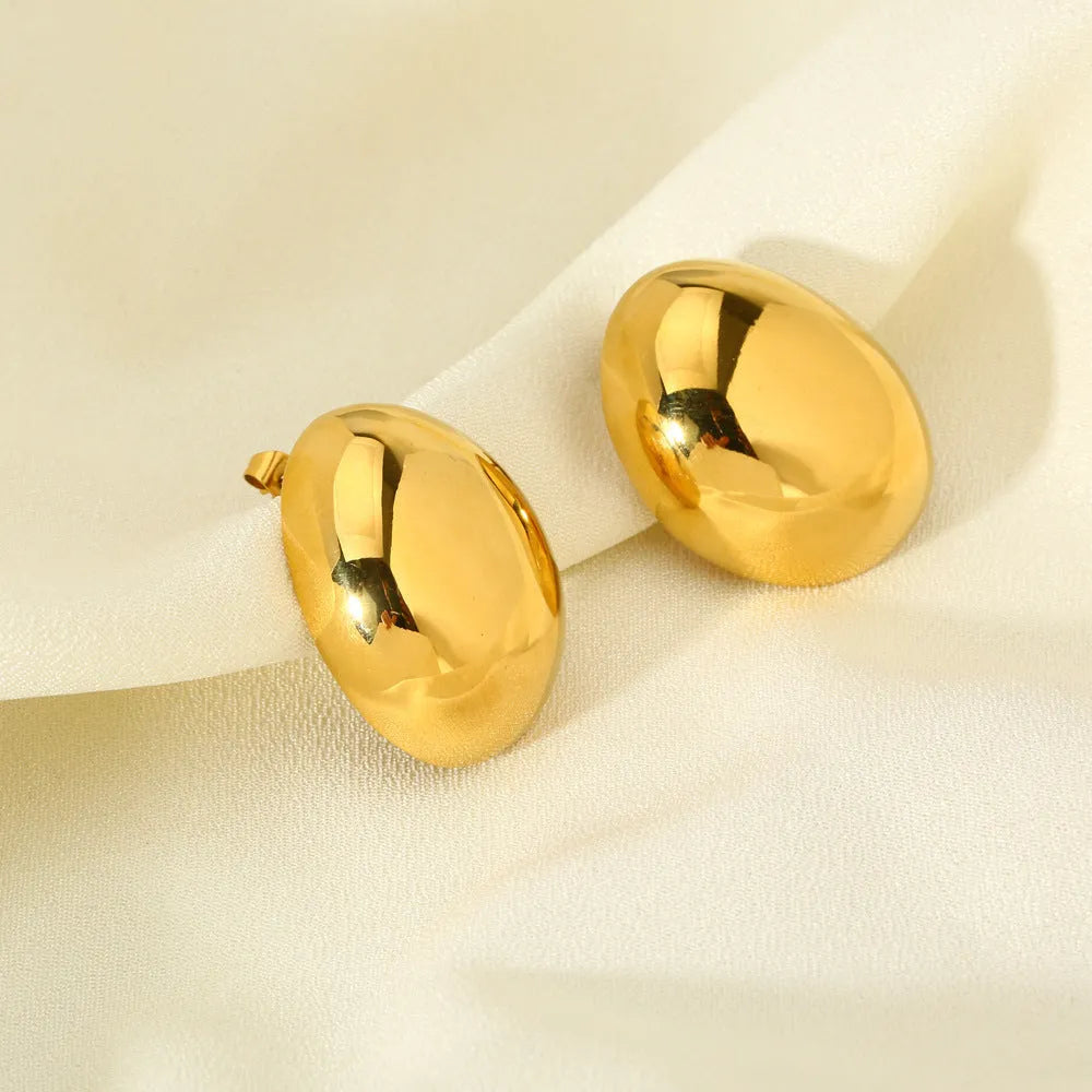 Geometric stainless steel ear studs with electroplated 18K gold finish and glazed surface in colour DFE139