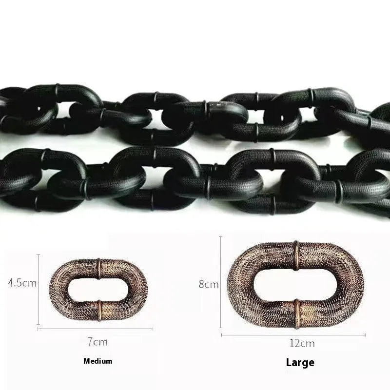 Metallic polypropylene simulation dog leash prop in bronze, silver, and black colours on a white background.