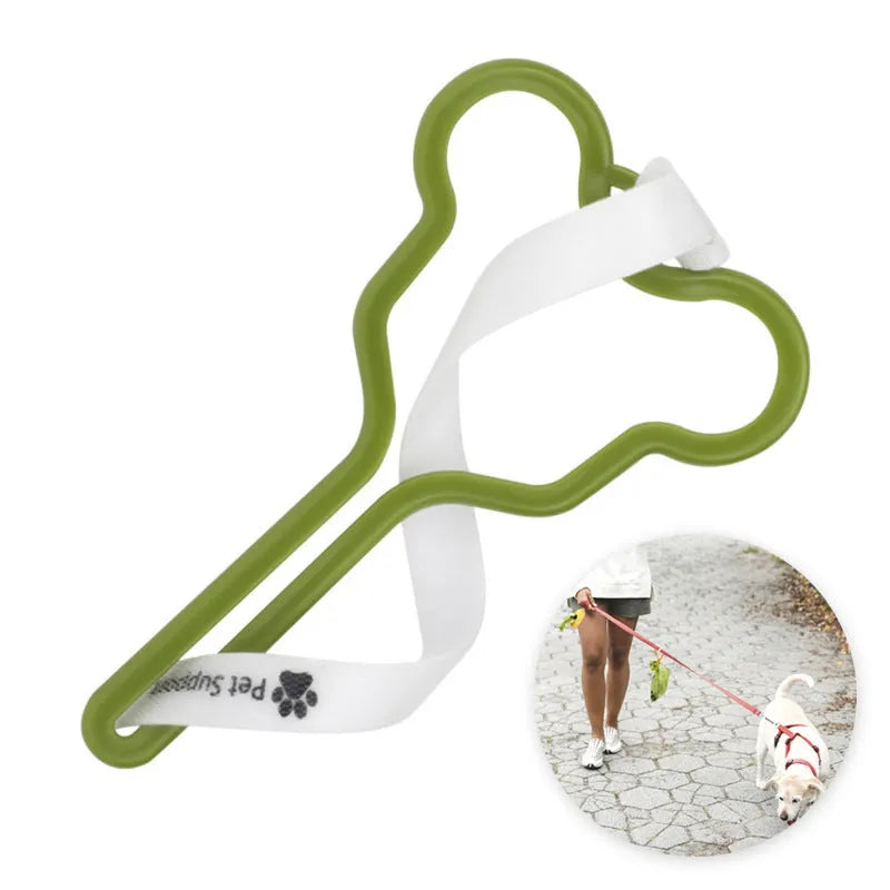 A coloured dog poop bag holder with a Velcro strap attached to a dog lead.