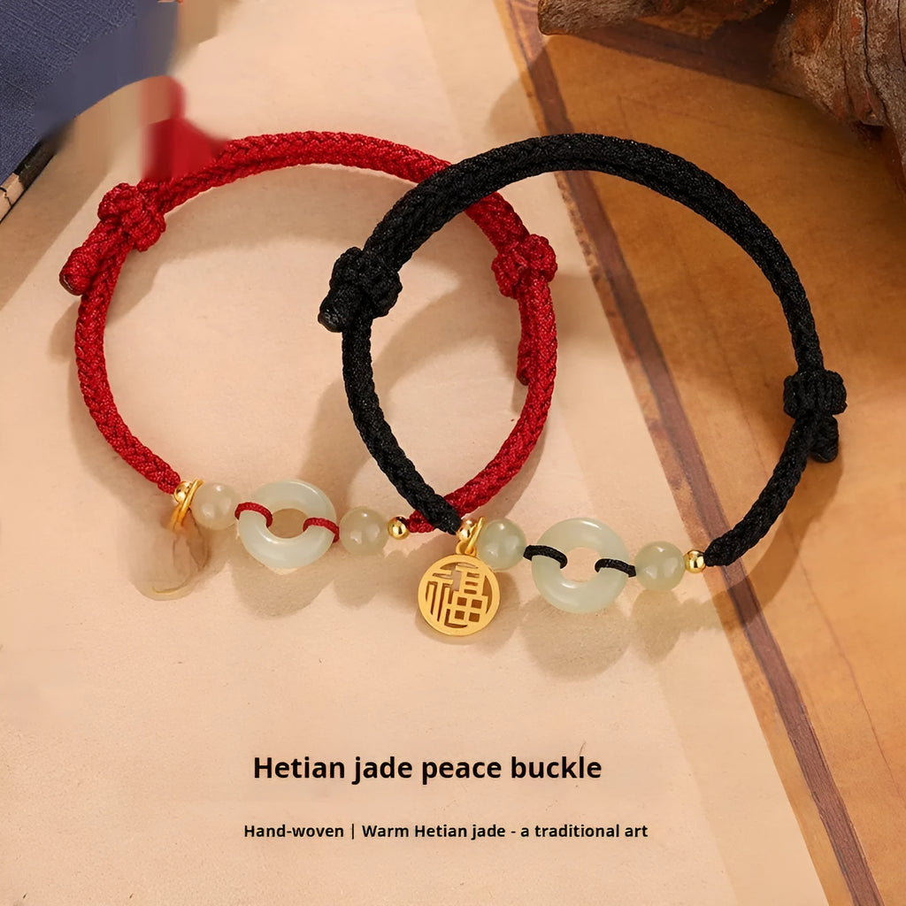 Silver peace buckle charm on adjustable cord bracelet in black or wine red