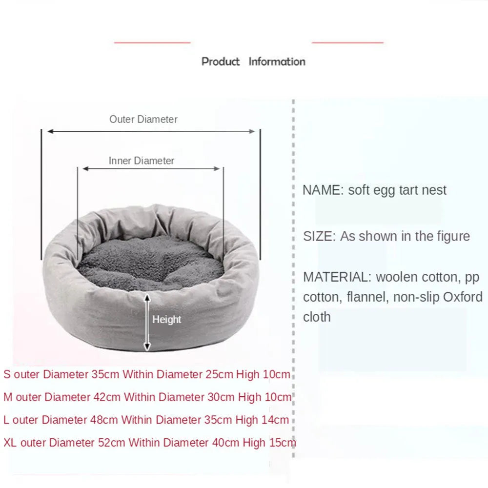 Grey round pet bed with raised rim and pillow for small dogs or cats on a wooden floor.