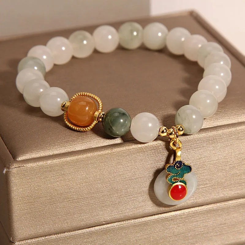 Ice jade colour bracelet with pearl decorations and Xiangyun peace jade buckle