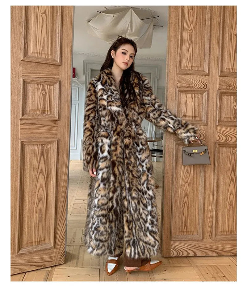 A long faux fur coat with a thick fur collar and pockets, shown in a street-fashion style.