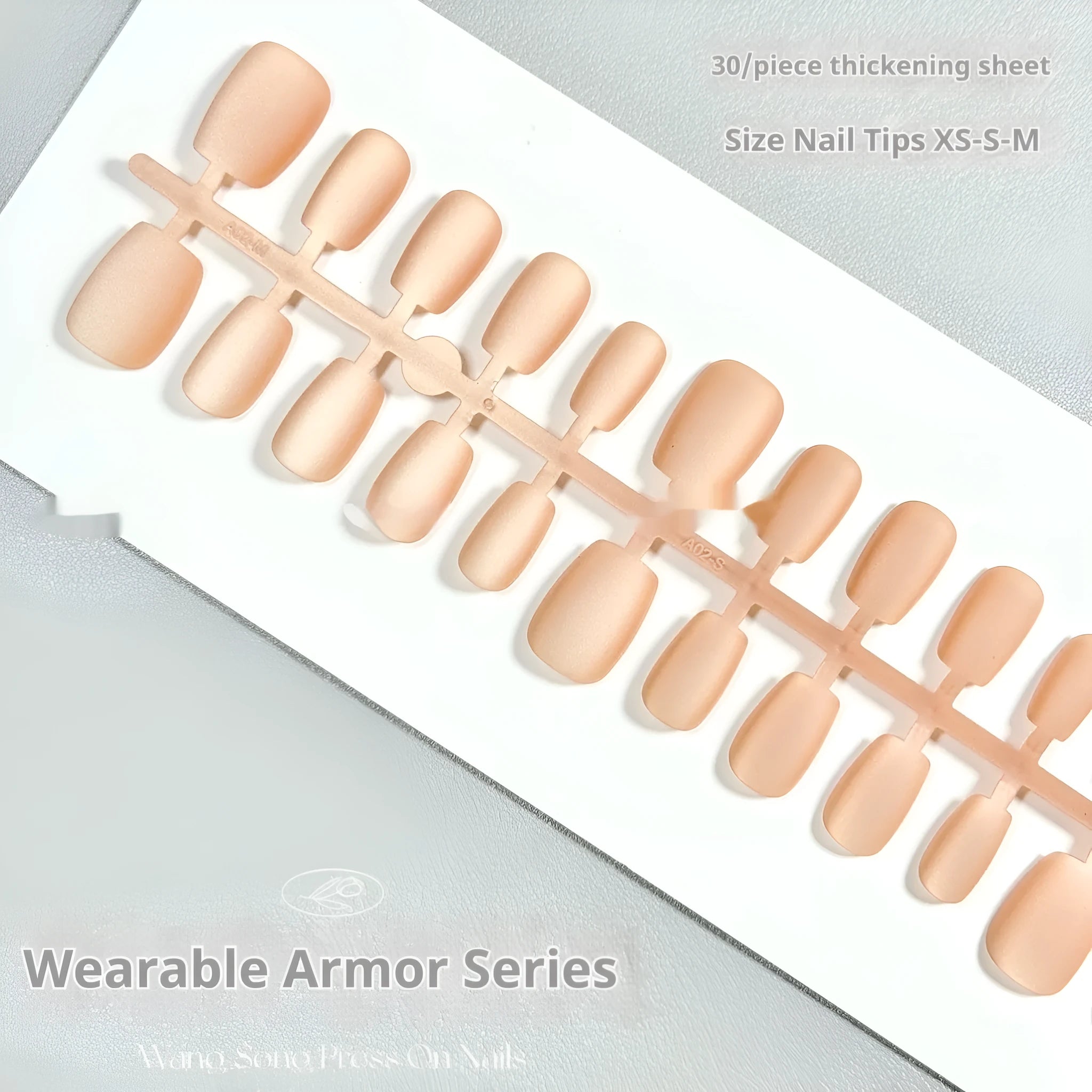 Velvet Frosted Cat's Eye false nail art set showing Aurora and solid colour designs on short ladder shaped nails.