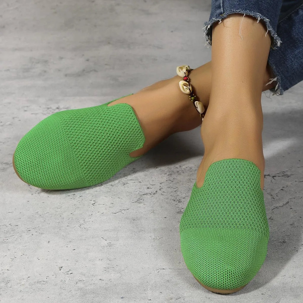 Apricot coloured casual mesh slip-on sandals with a round toe and flat rubber sole.