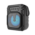 Portable Bluetooth speaker with compact design and USB charging cable